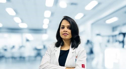 Dr Varsha C B